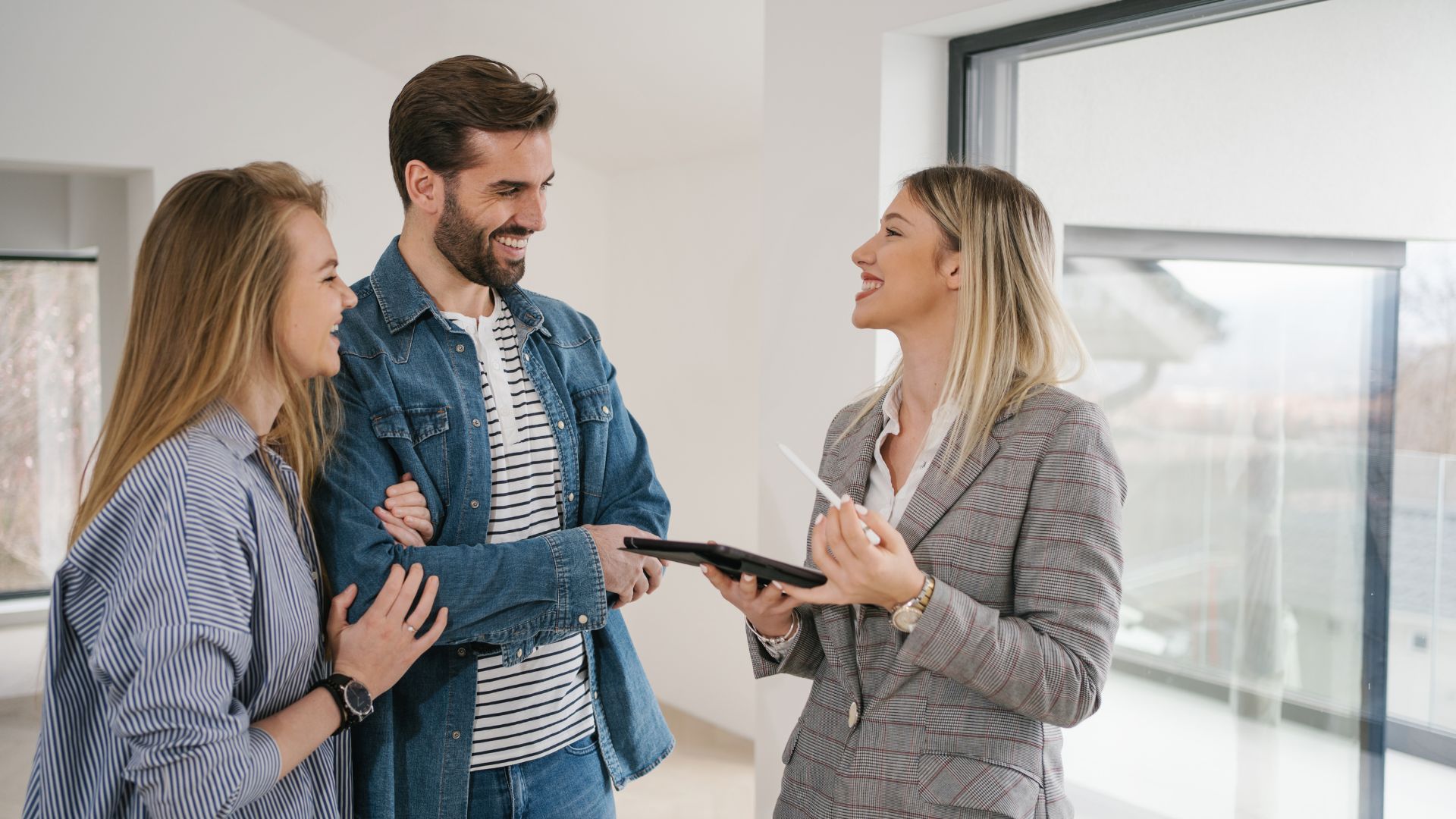 property manager speaking to a couple